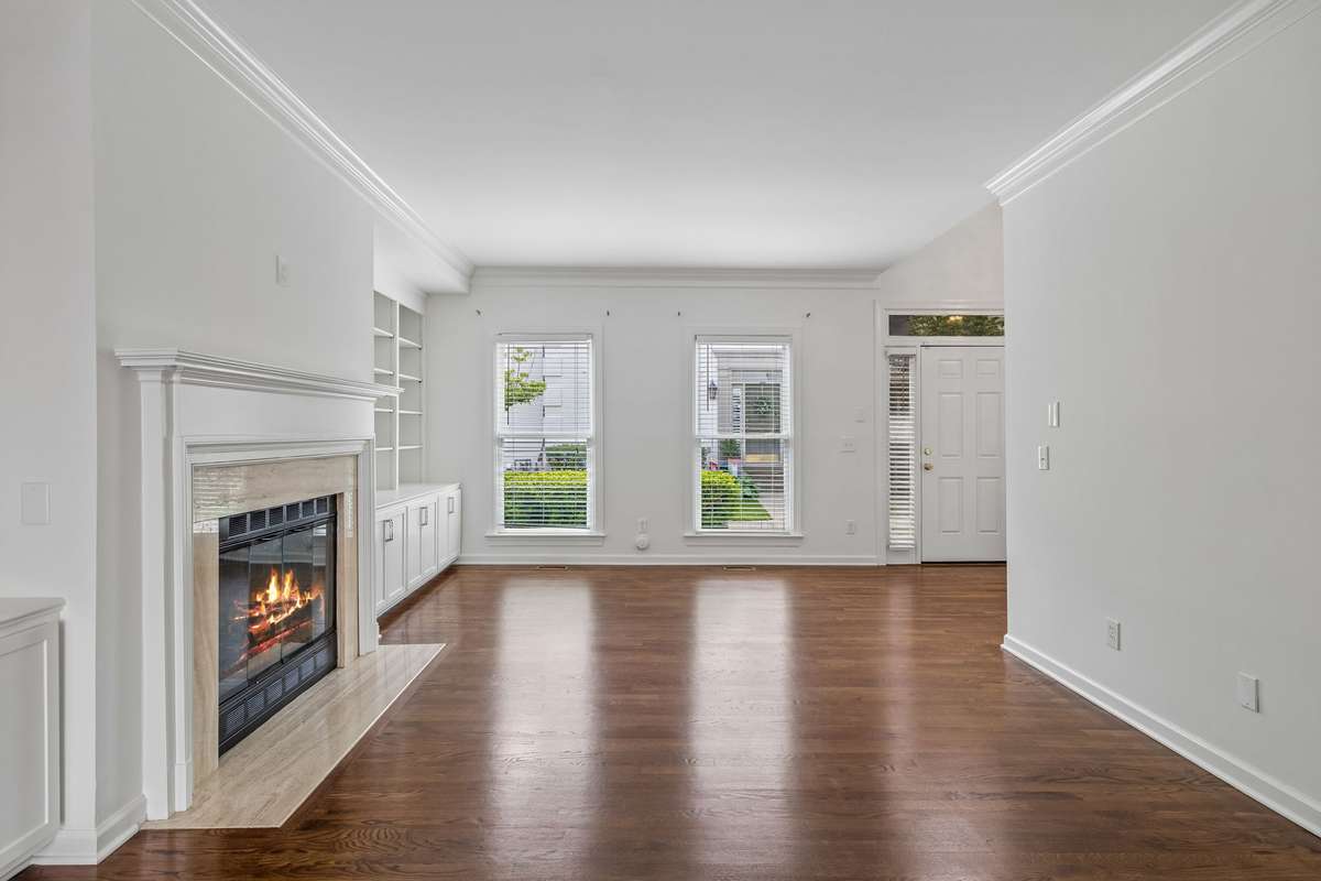 Lots of light in this home.  2" wood blinds covering these windows.