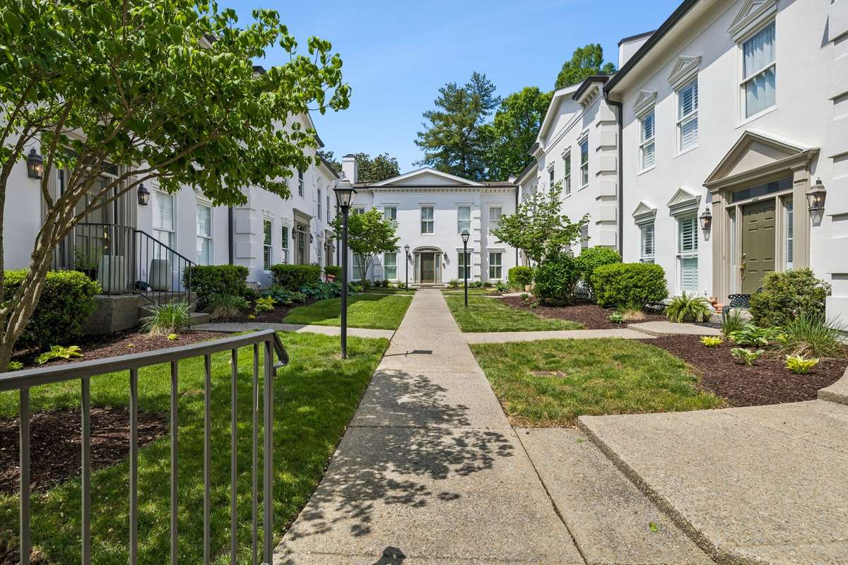 Beautiful courtyard leads to your new home at 3037 Woodlawn!