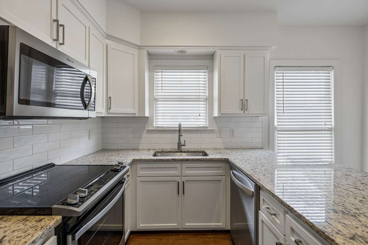 Beautiful granite and updated cabinets.