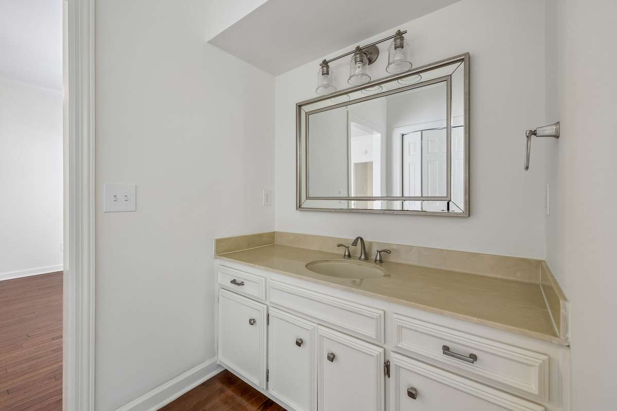 Large vanity in the primary bedroom bath.