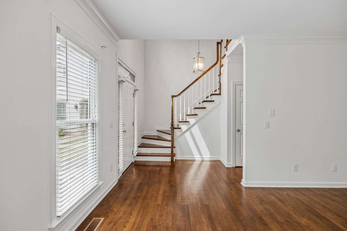 Note coat closet to the right of staircase.