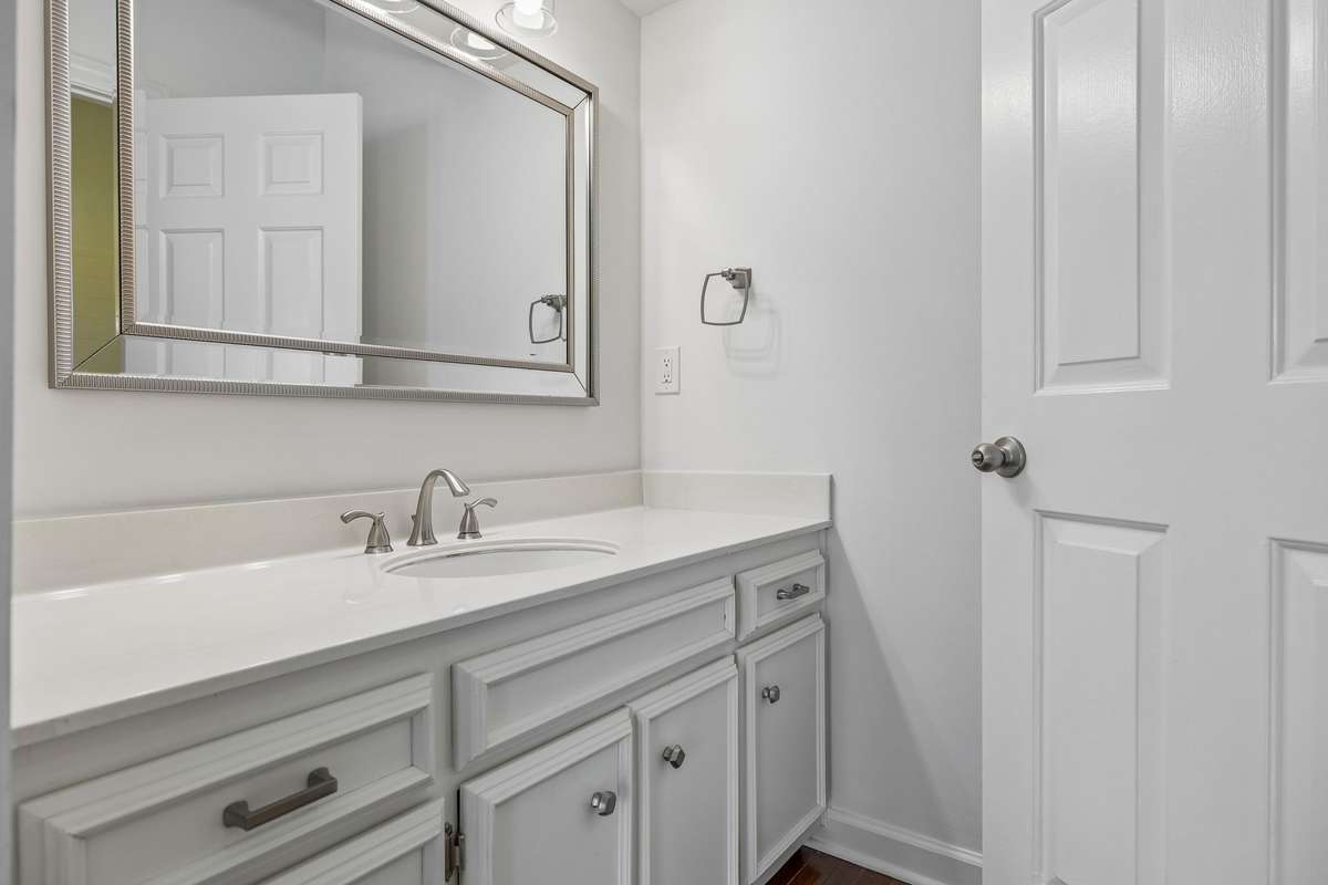 Secondary bedroom adjoins private bath ensuite.