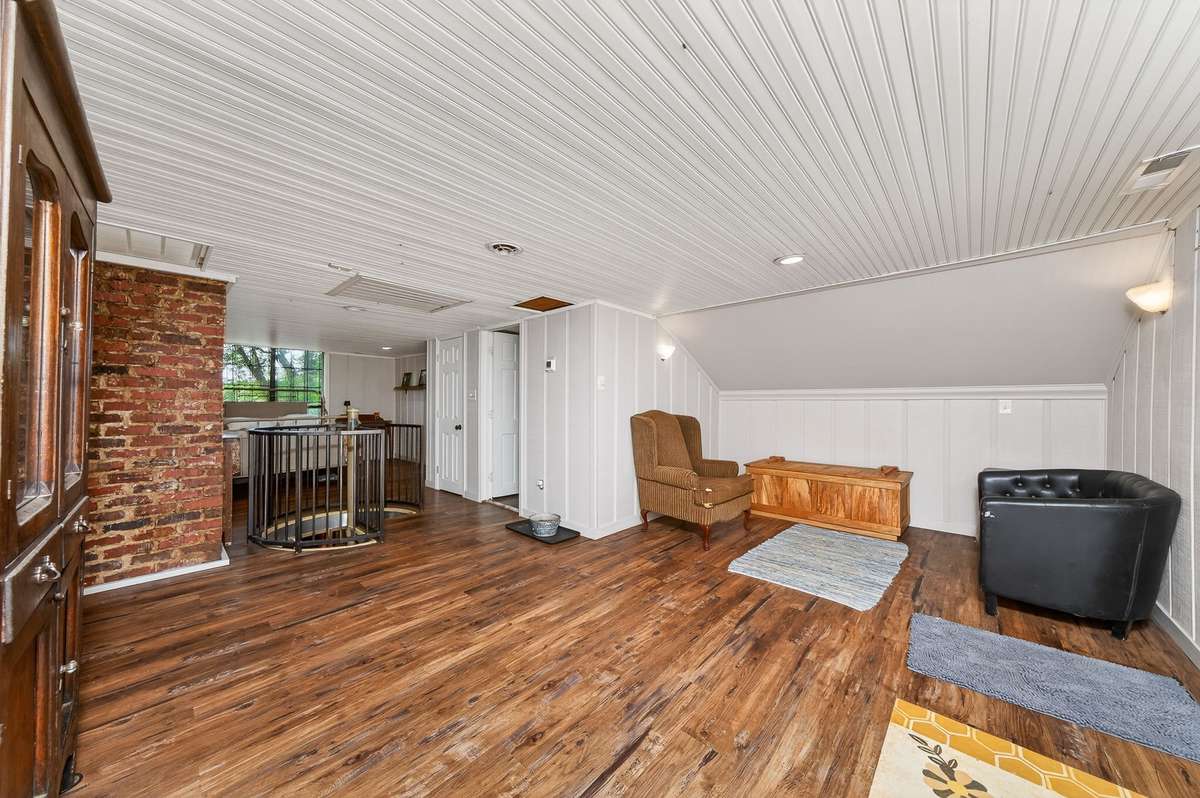 second view of sitting area .  upstairs is large enough to divide and make it 2 bedrooms