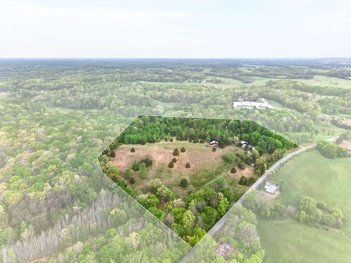 Lots of road frontage over 50 % woods.