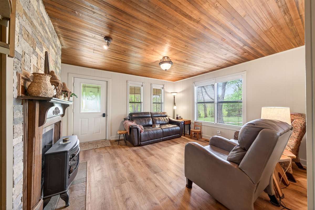 cozy up in Living room original wood ceiling.