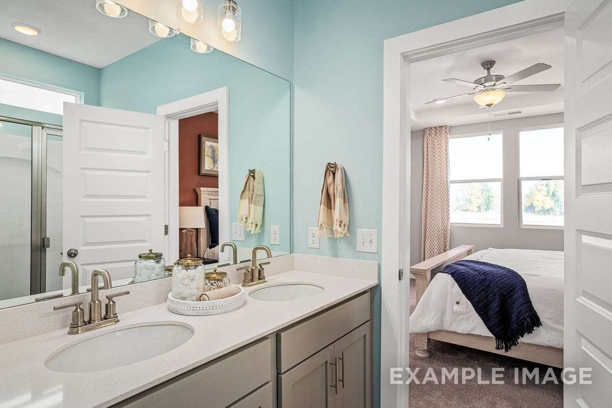 Picture of actual home being sold.  Furniture is being removed, but curtains and appliances are being sold with home