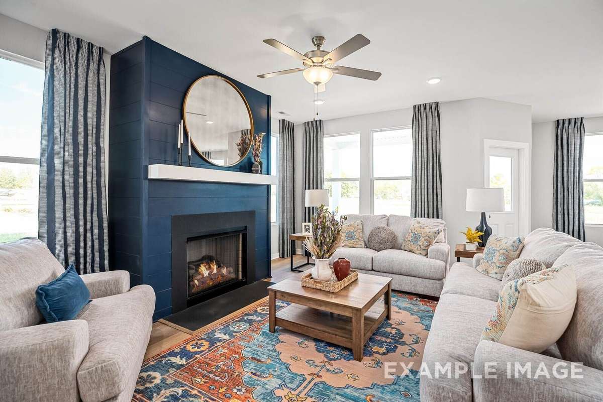 Picture of actual home being sold.  Furniture is being removed, but curtains and appliances are being sold with home