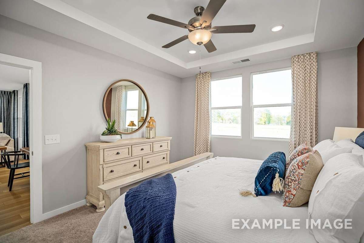 Picture of actual home being sold.  Furniture is being removed, but curtains and appliances are being sold with home
