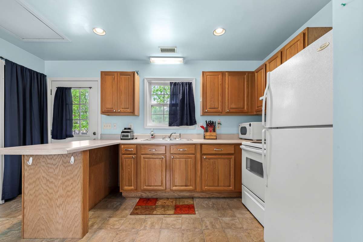 Stove, refrigerator, microwave  remain.