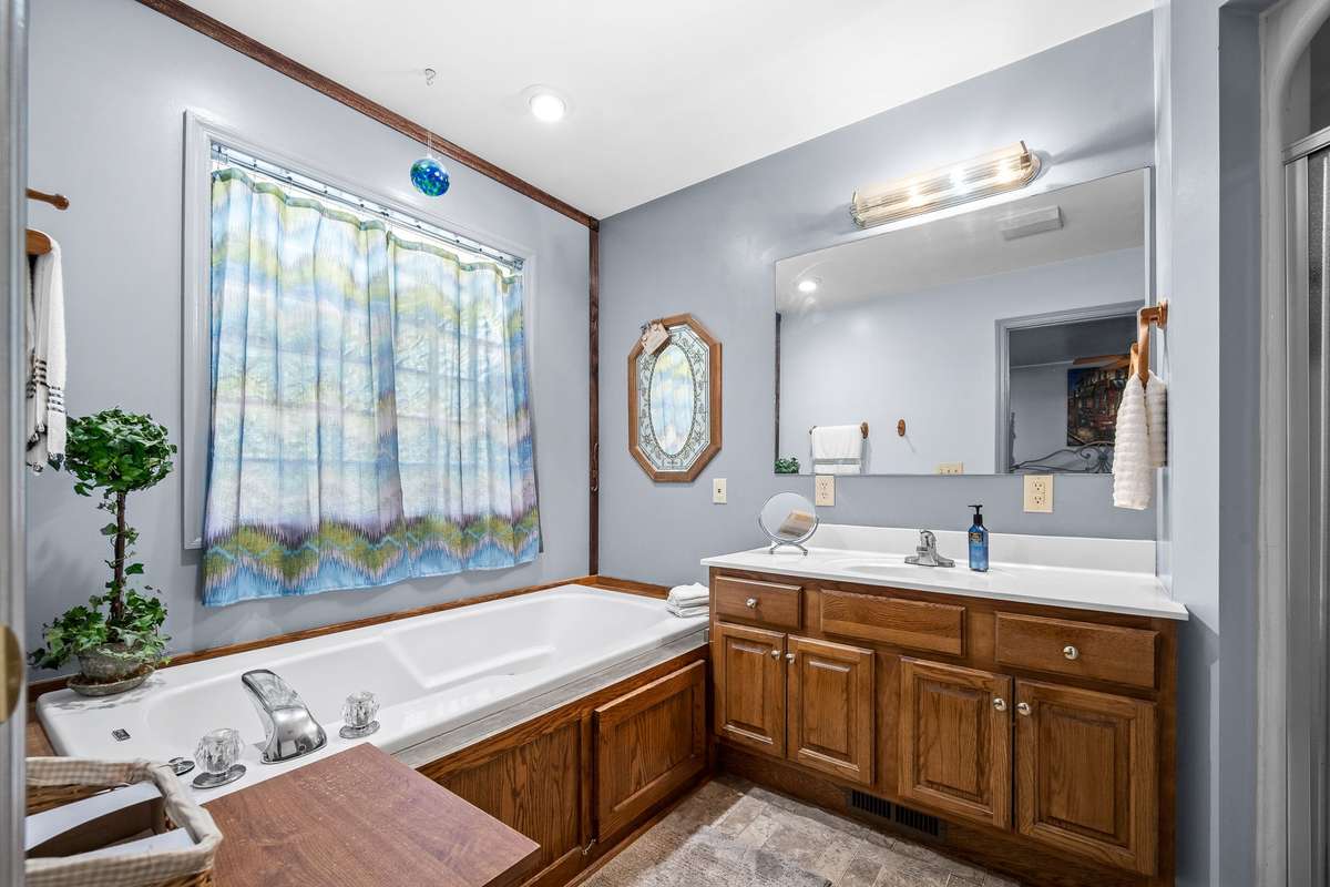 Primary Bath with whirlpool tub.