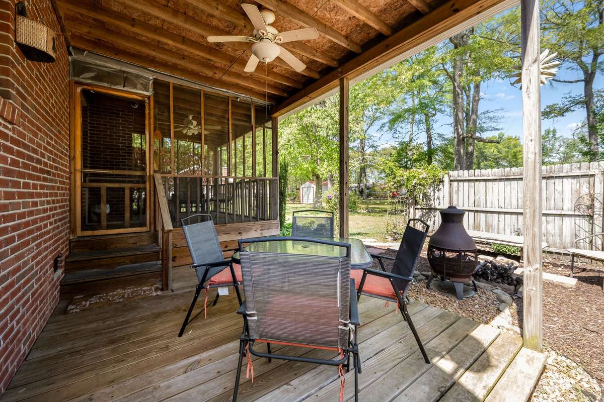 Wood fence makes the covered deck private.