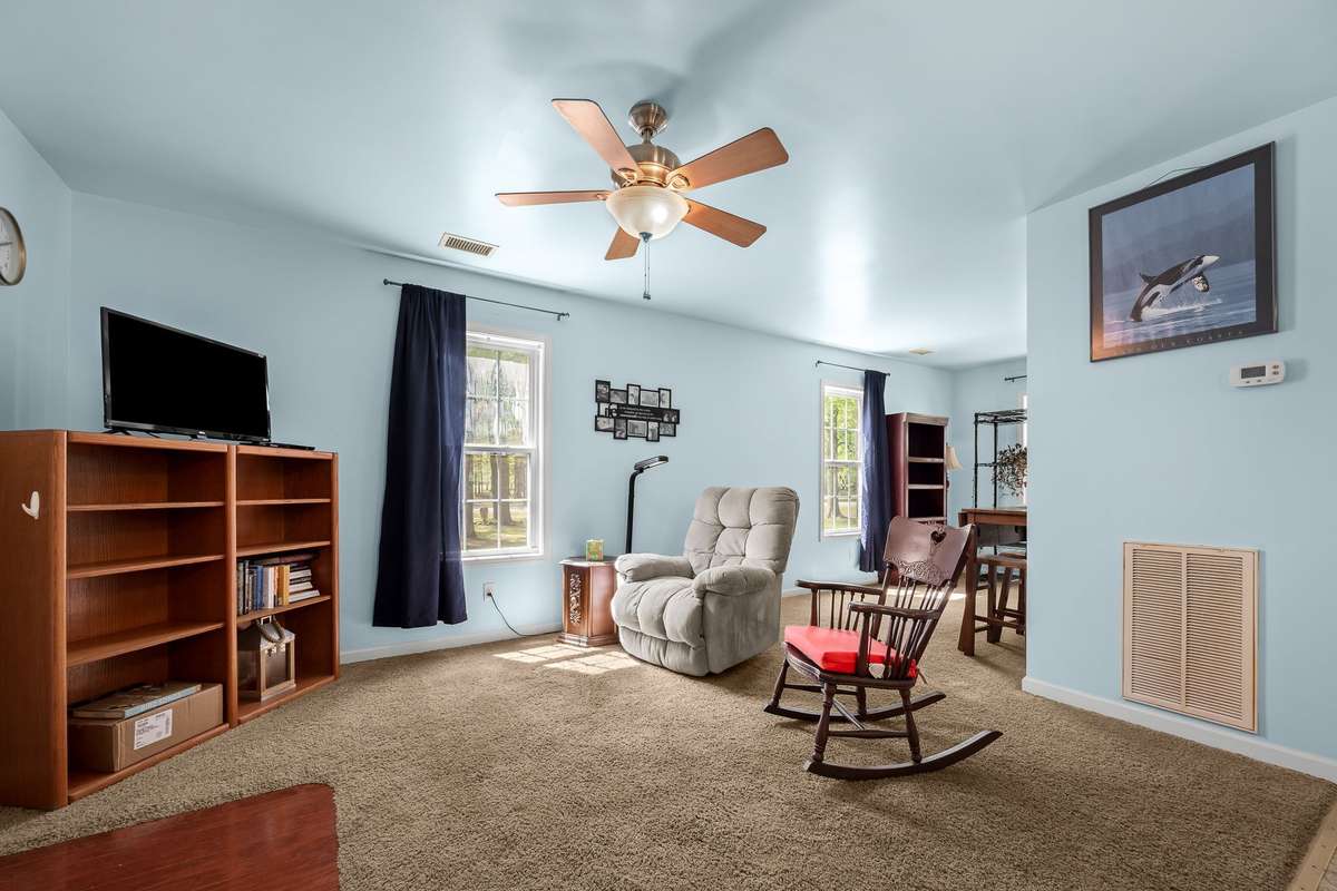 Open living room and bedroom.