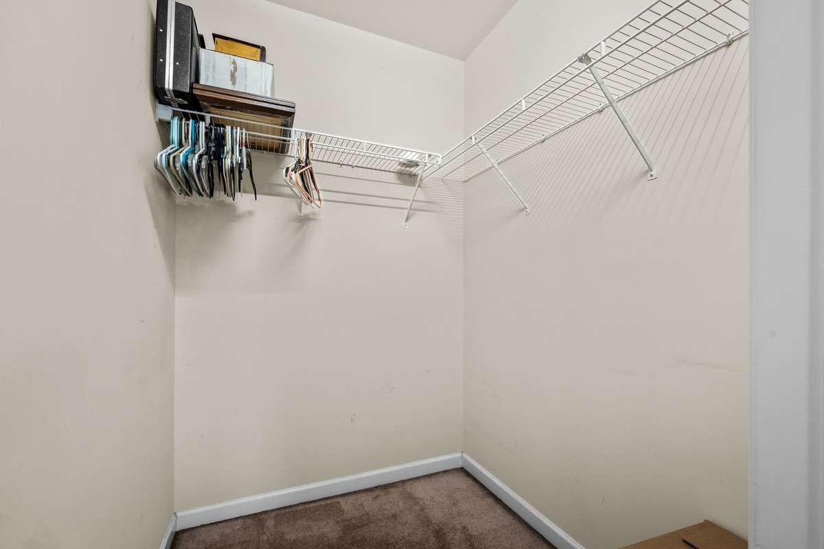 Walk-in closet in upstairs bedroom.