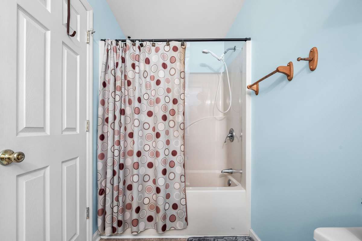 Tub/shower combination in upstairs bath.