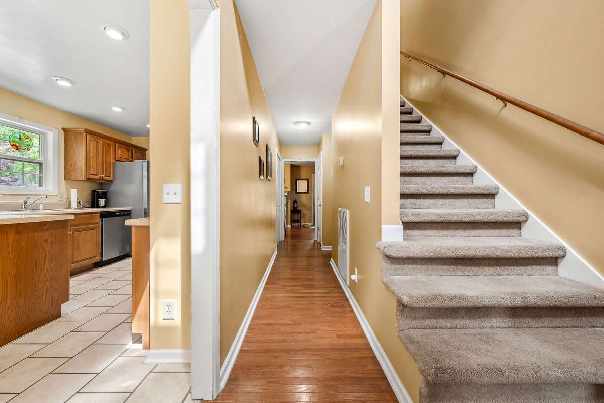 Hallway leading to back Dining area or could be a nice sitting area with a fireplace.