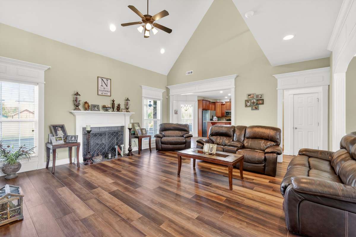 Nice Sized Great Room With Vaulted Ceiling And Fireplace