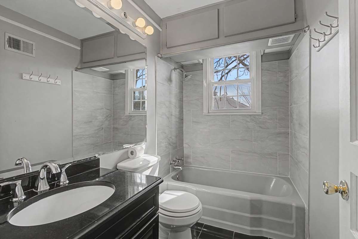 Good size bathroom with fresh paint.