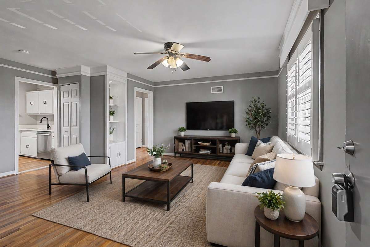 Large living room with true hardwood flooring throughout. Virtual staged furniture.