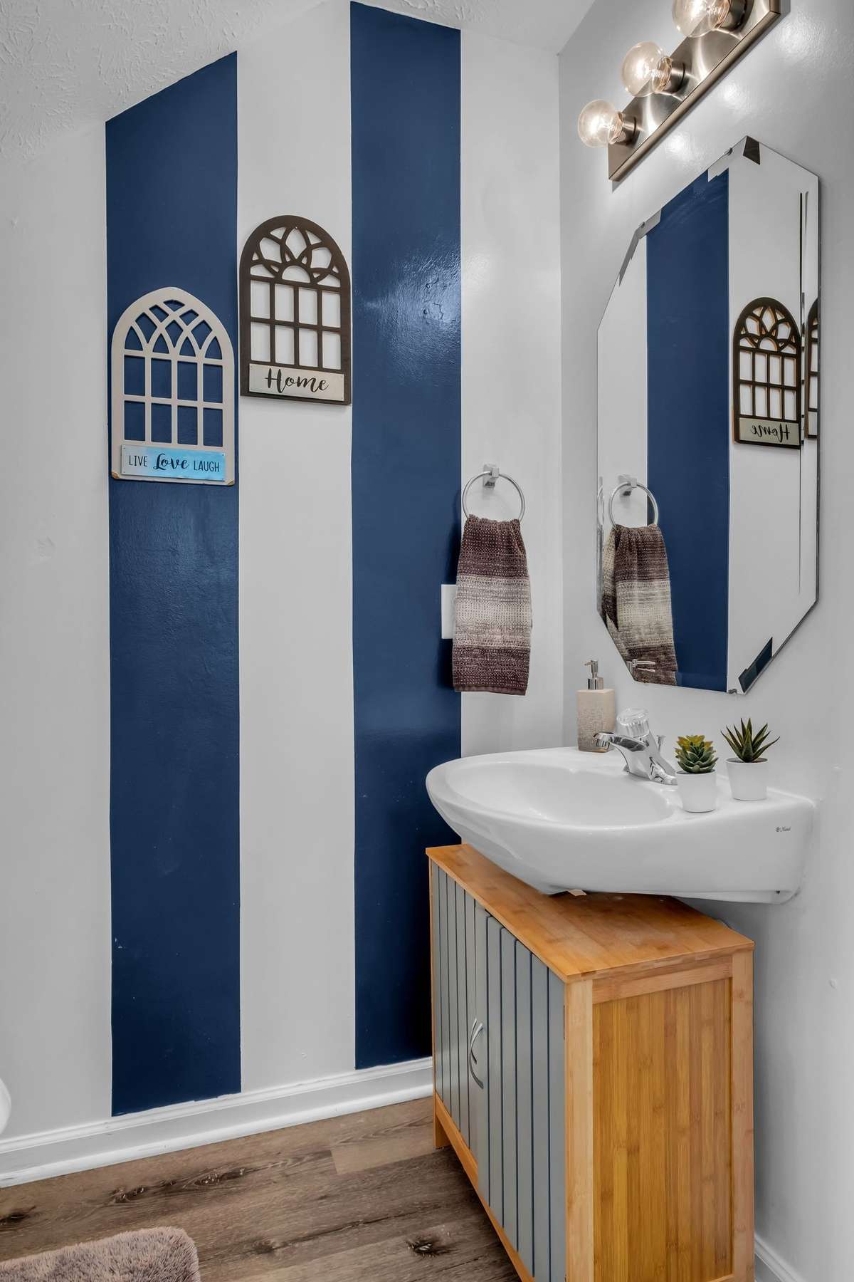 Cute downstairs powder room.