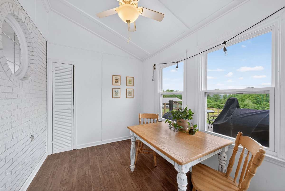 Sunroom with a view of the backyard