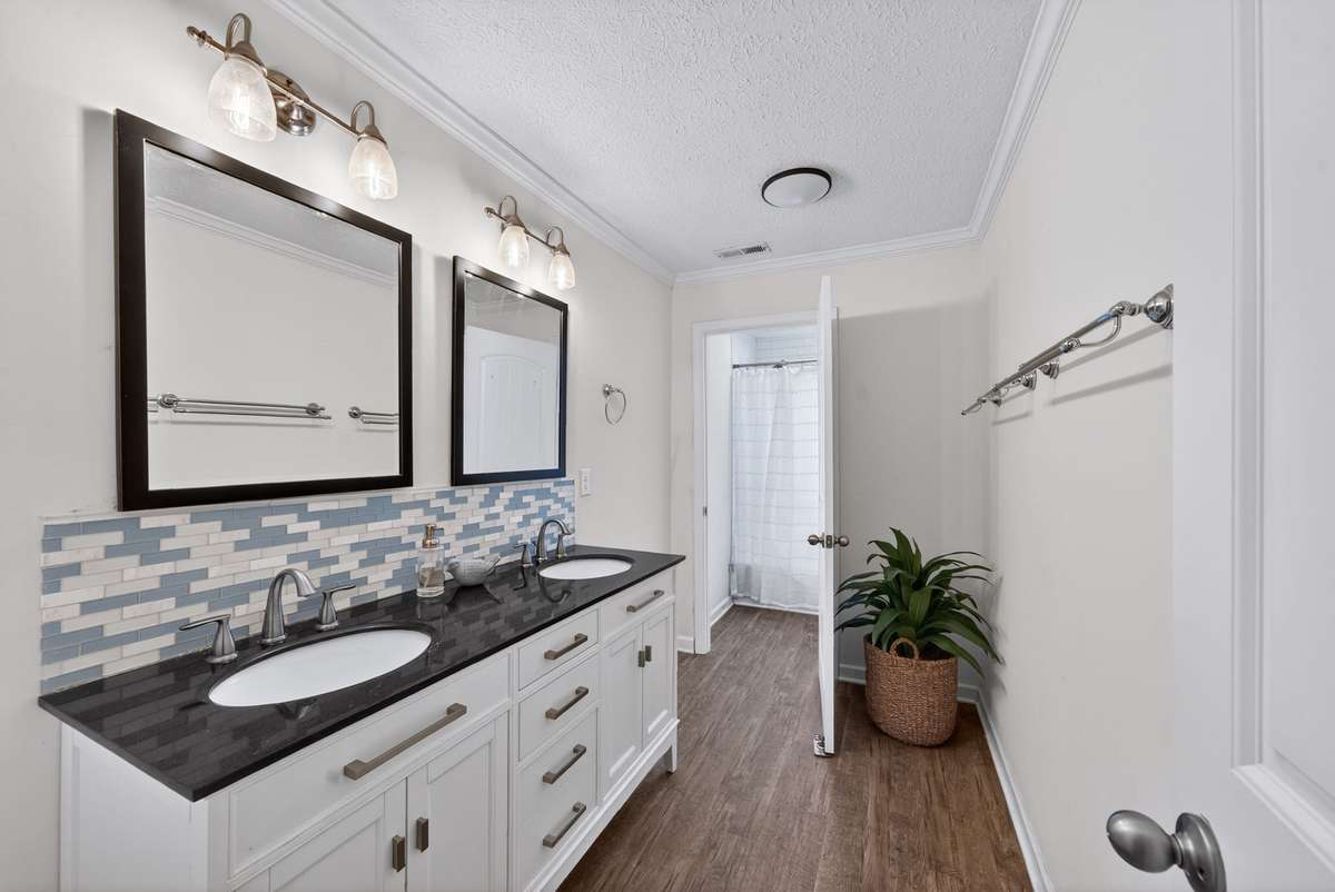 Full bathroom on the second level in between the two bedrooms