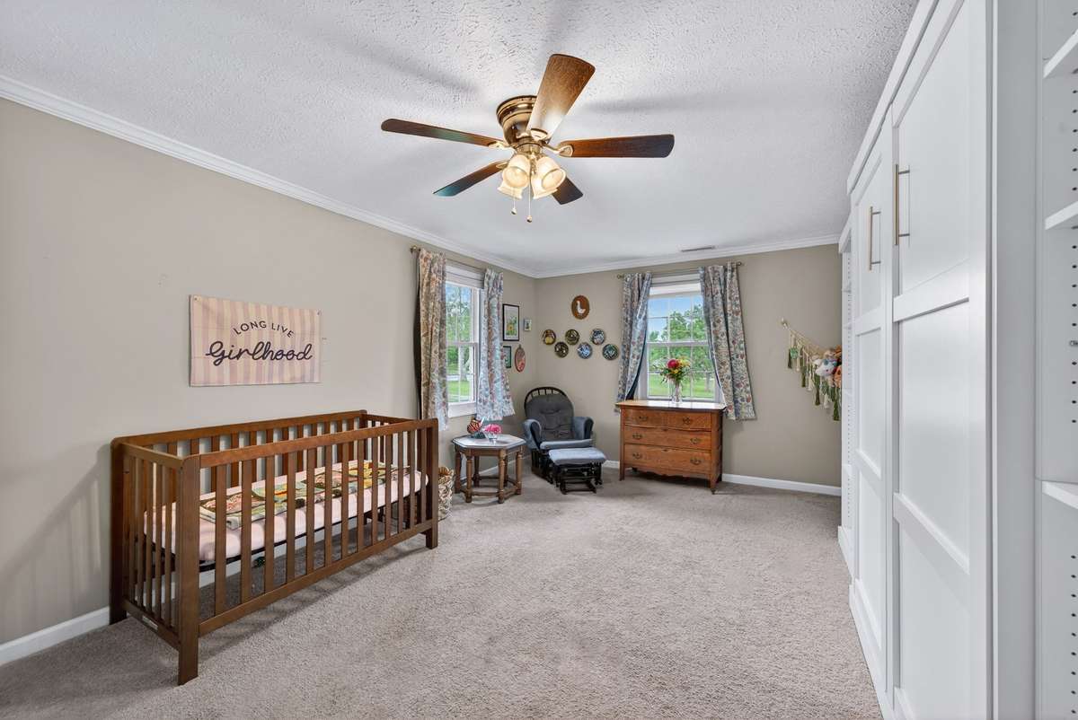 extra large bedroom with walk in closet and built in Murphy bed