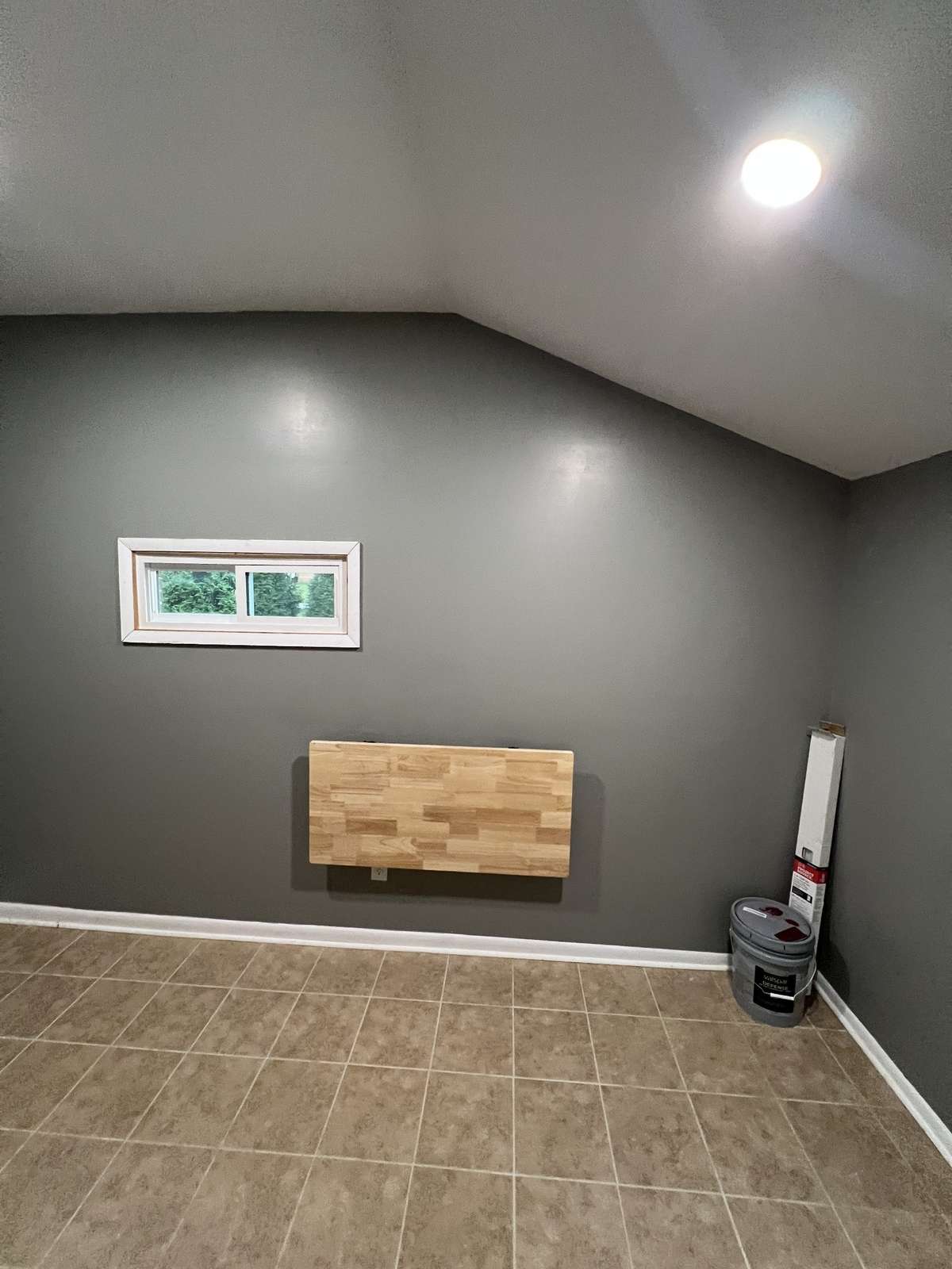 This mud room has huge ceilings and plenty of room for storage.