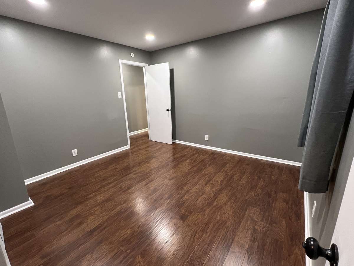 Bedroom 1: From the half bath you can see just how large this 12x12 bedroom is!