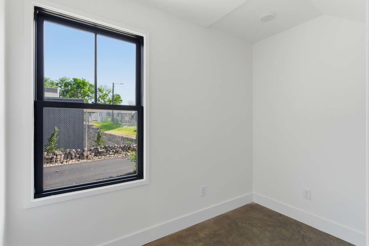 Located on the first floor of the DADU, this versatile space serves as a quiet and private guest bedroom.