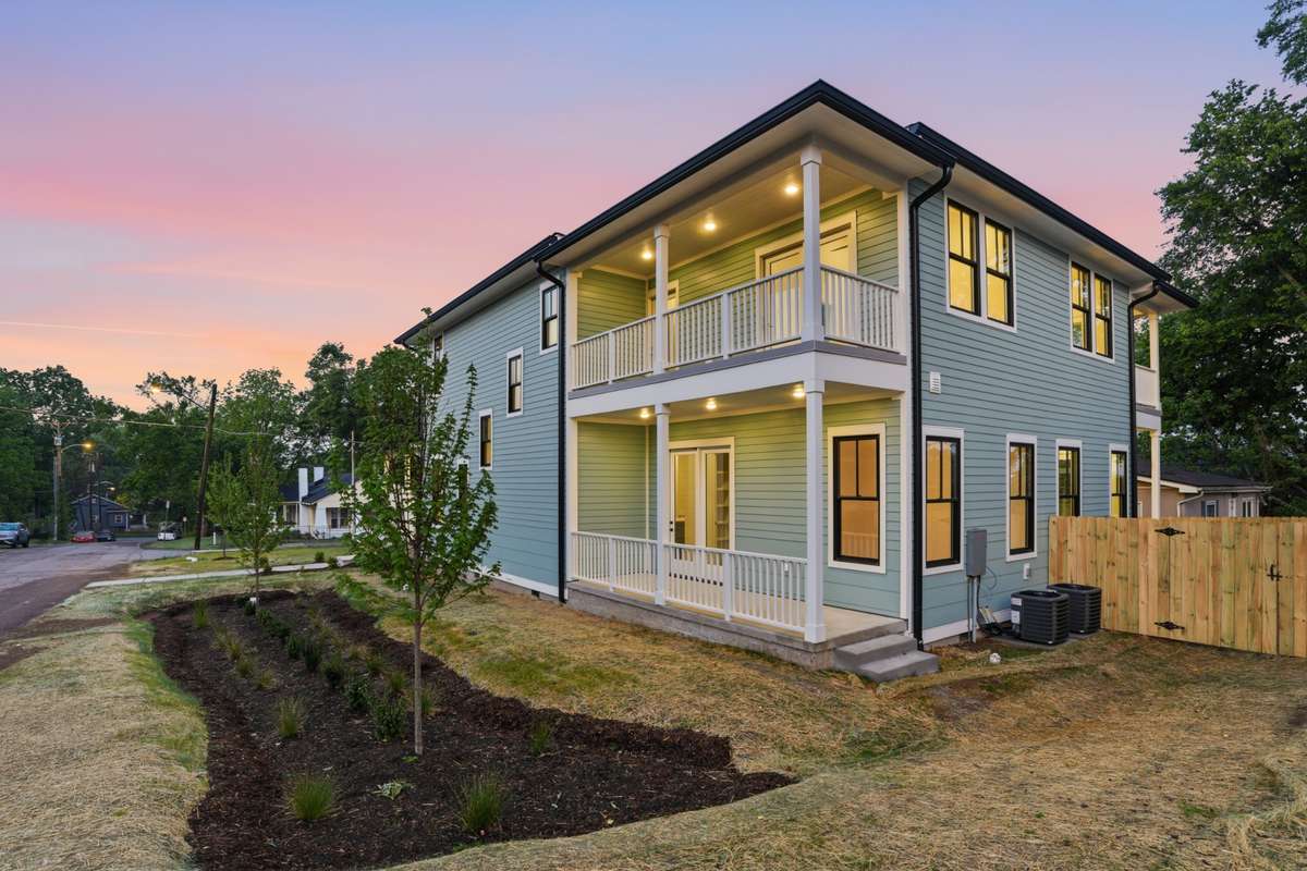 This stunning new build features multiple covered outdoor spaces designed for relaxation.