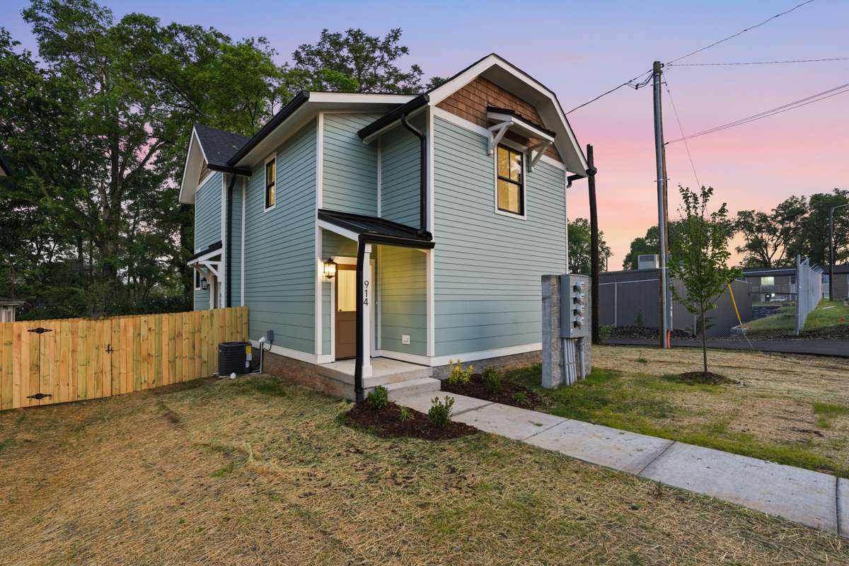 The property features a spacious detached DADU with its own private front door entrance, offering a completely separate living space.