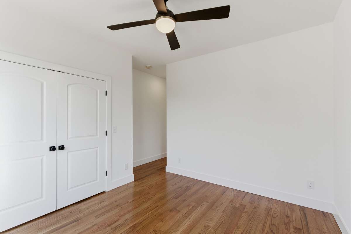 If you don't need all the bedrooms, this secondary bedroom is a great option for a home office.