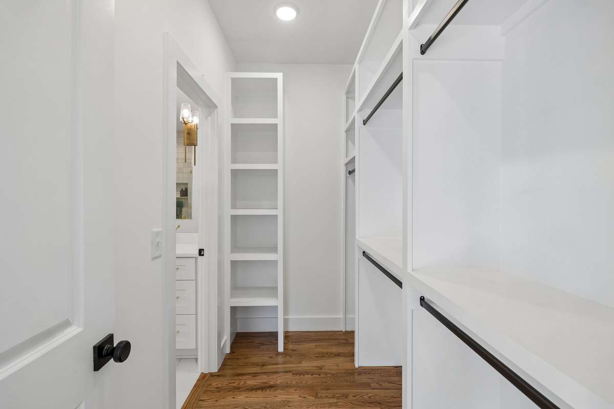 The walk-in closet includes built-ins to maximize your storage space.