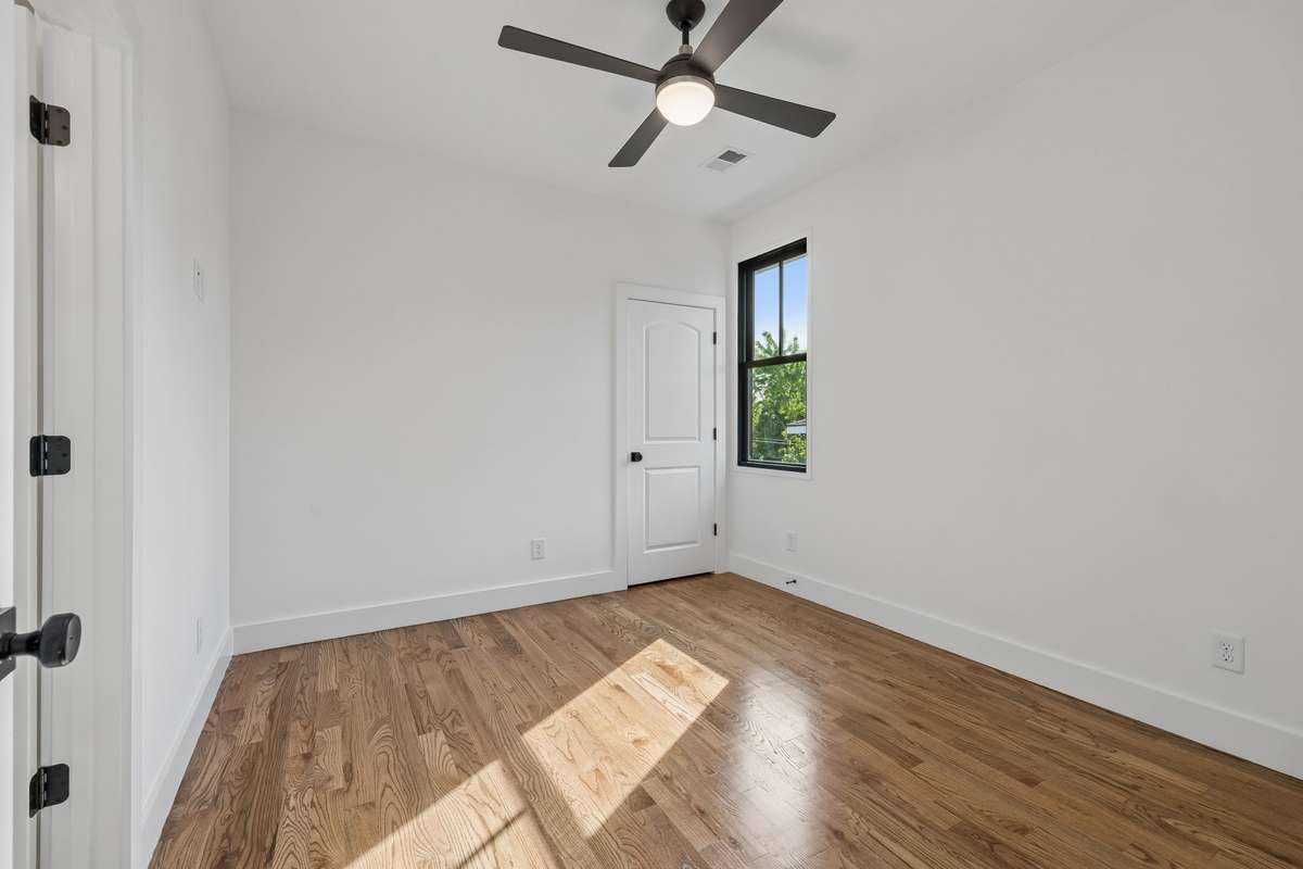 Two more comfortable guest bedrooms are located on this level. Both feature plenty of closet space.