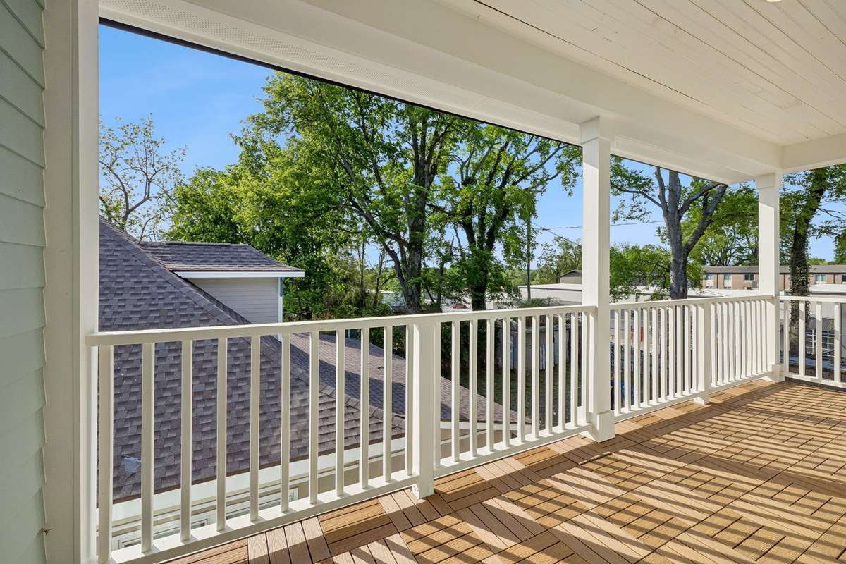 Open them up to enjoy your covered balcony! Just imagine savoring your morning coffee out here on spring mornings.
