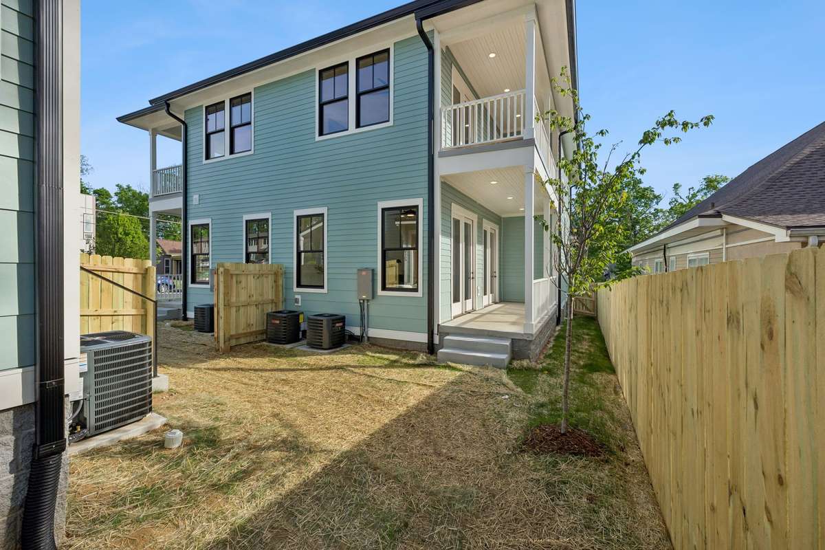The fenced side yard is perfect for pets.