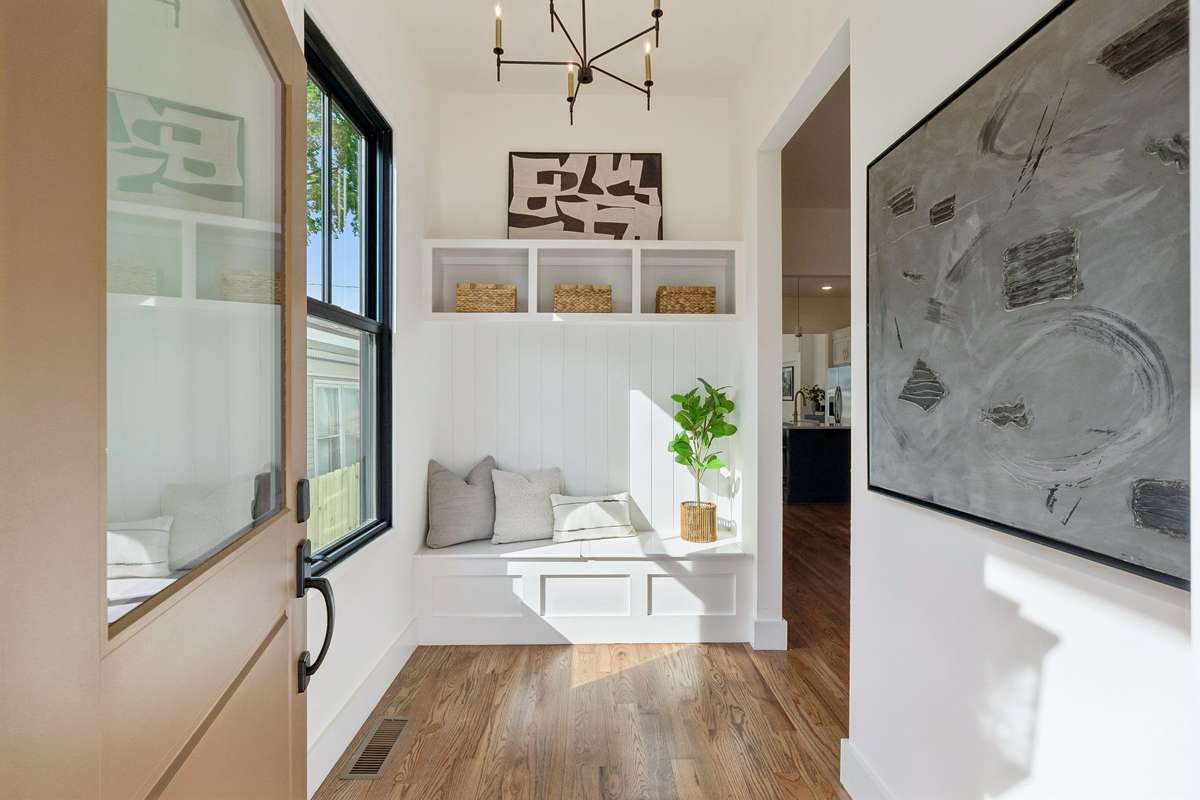 As you step inside, a thoughtful built-in greets you! This convenient drop-off zone instantly cuts down on clutter.
