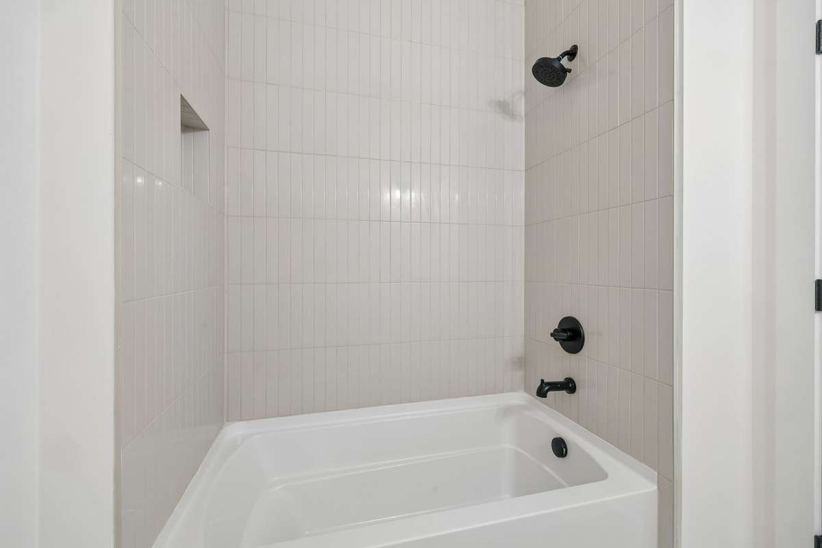 The convenient shower/bathtub combo makes the most out of this space.