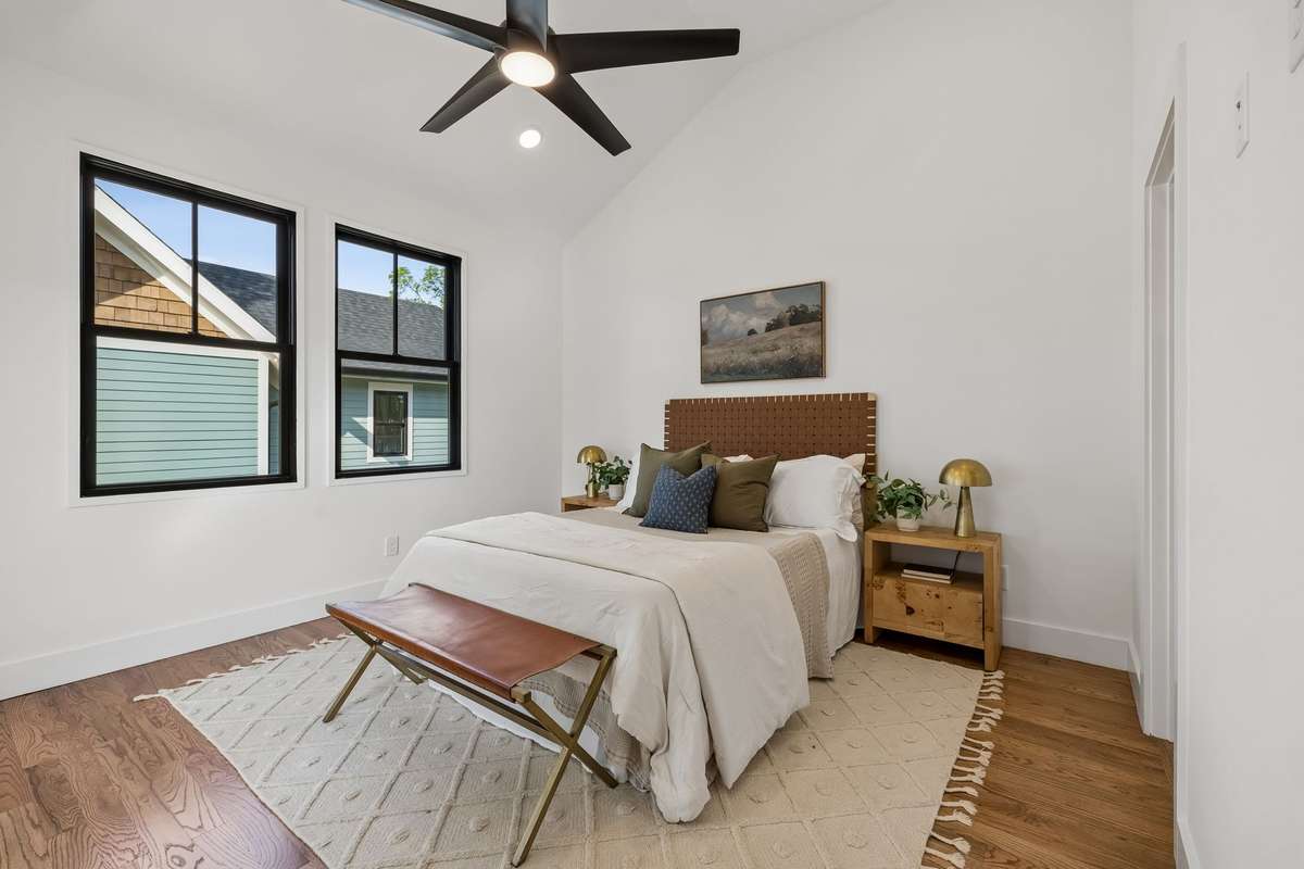 Continue upstairs to the sunlit owner's suite!