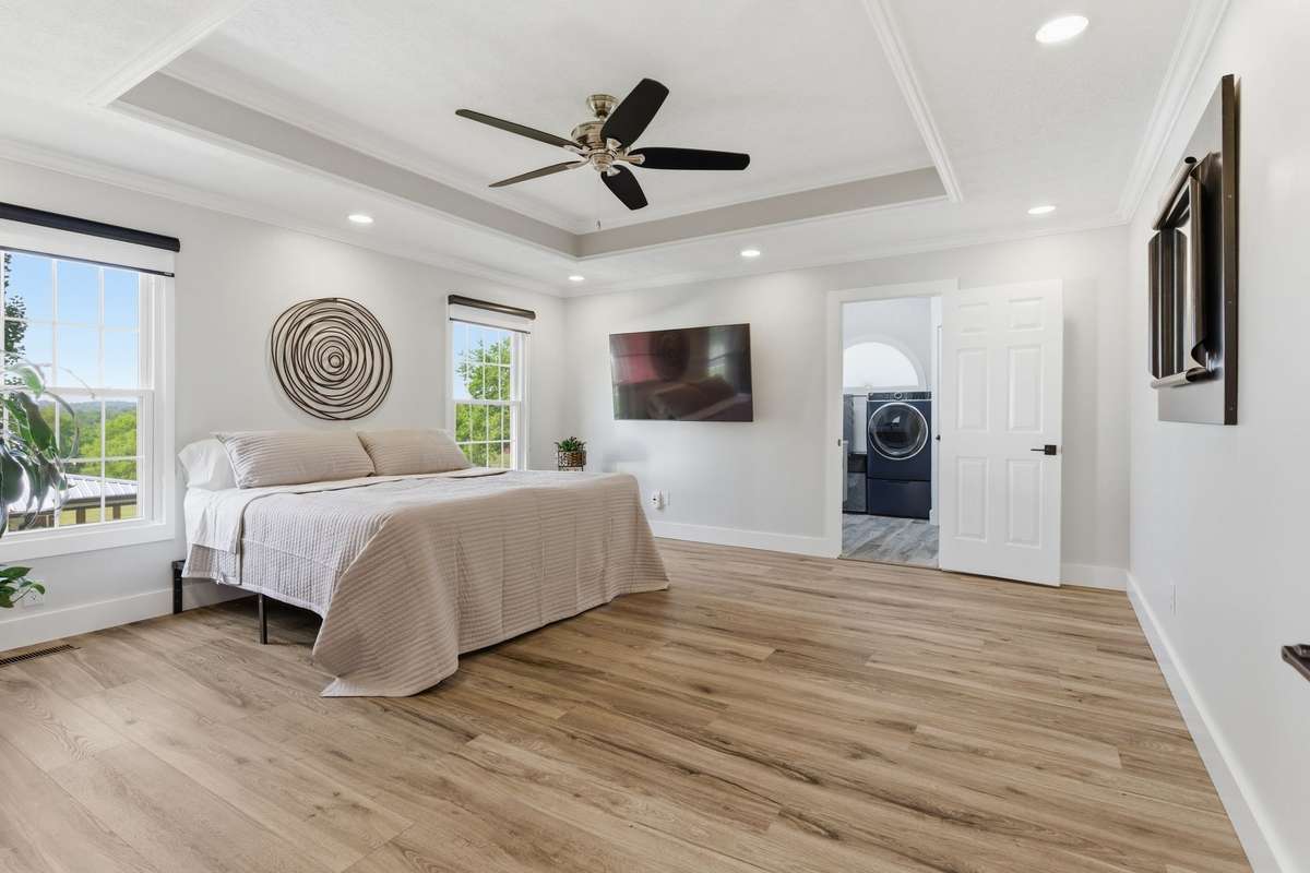 Very large master suite with tray ceilings.