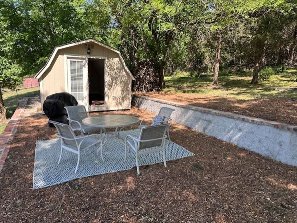 Large finished shed with electricity.