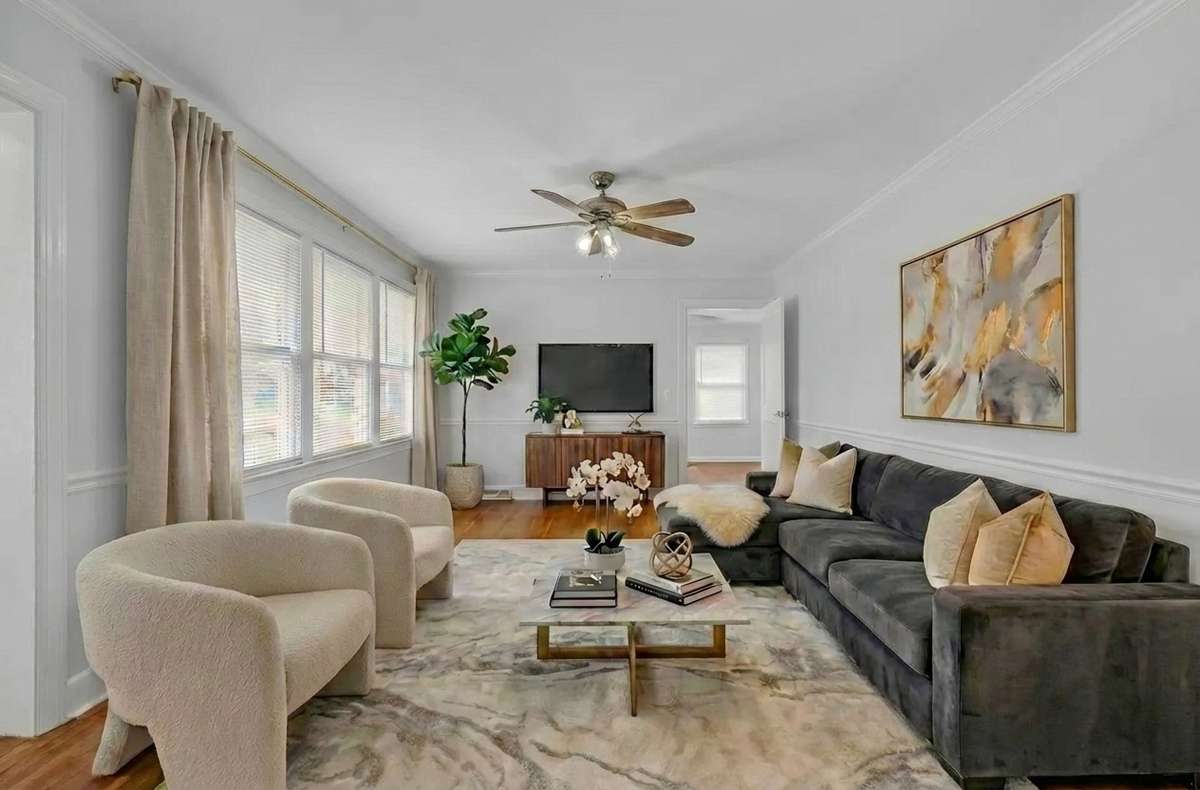 Living room is Virtually Staged to show sizing, space & design ideas