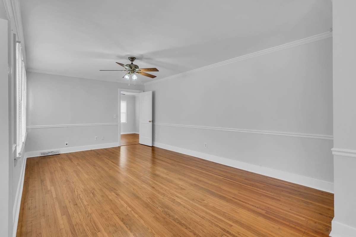 Another view of the front living room with plenty of space for the whole family to gather and hang out