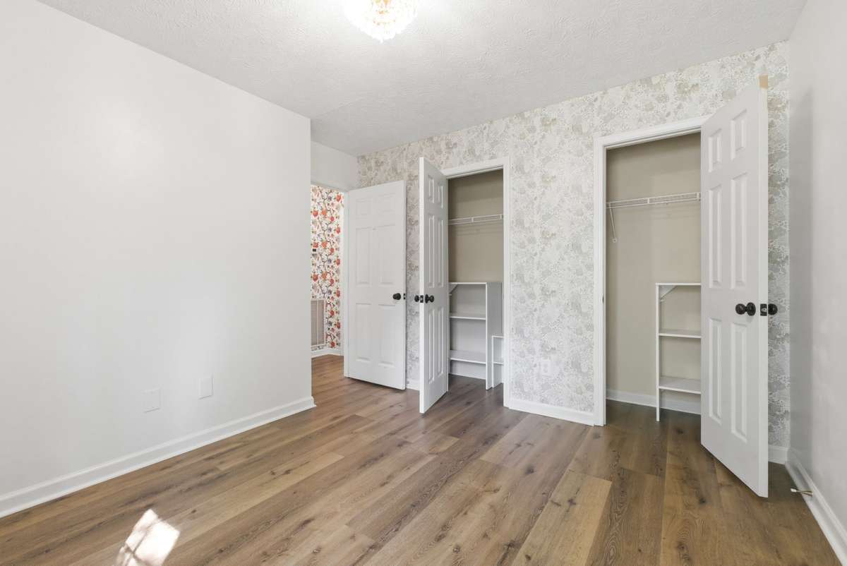 Beautiful accent wall with sweet wallpaper.