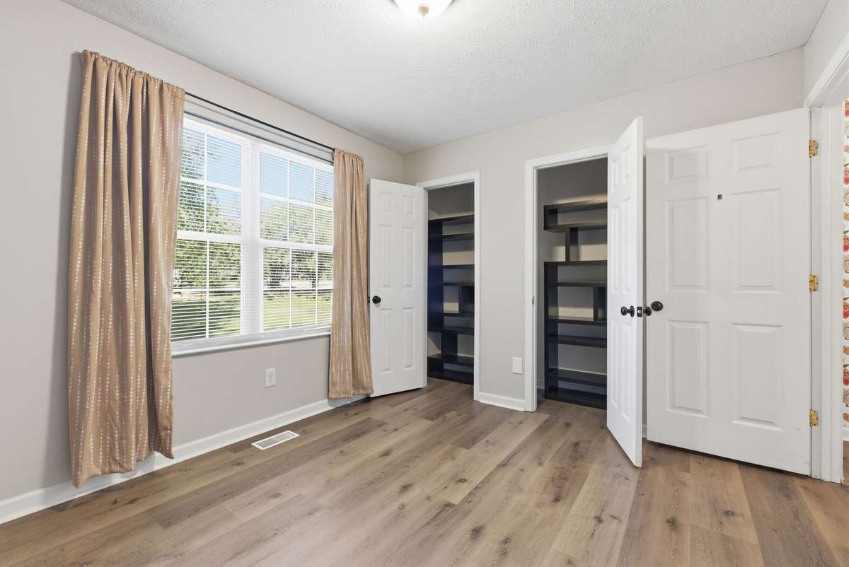Custom shelving in the closets. Can easily be removed to add hanging clothes.