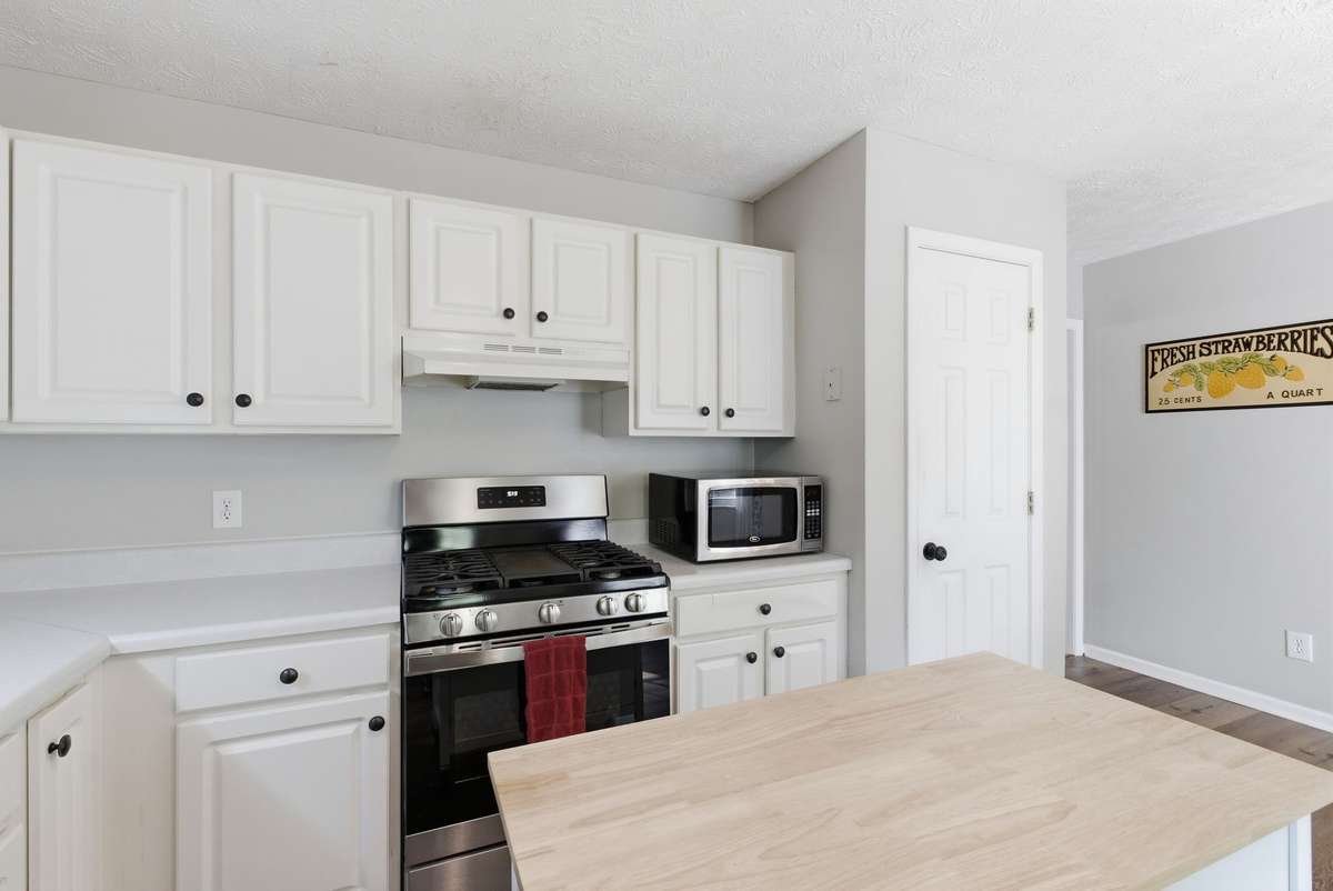 Plenty of cabinet space, PLUS a pantry in this kitchen!