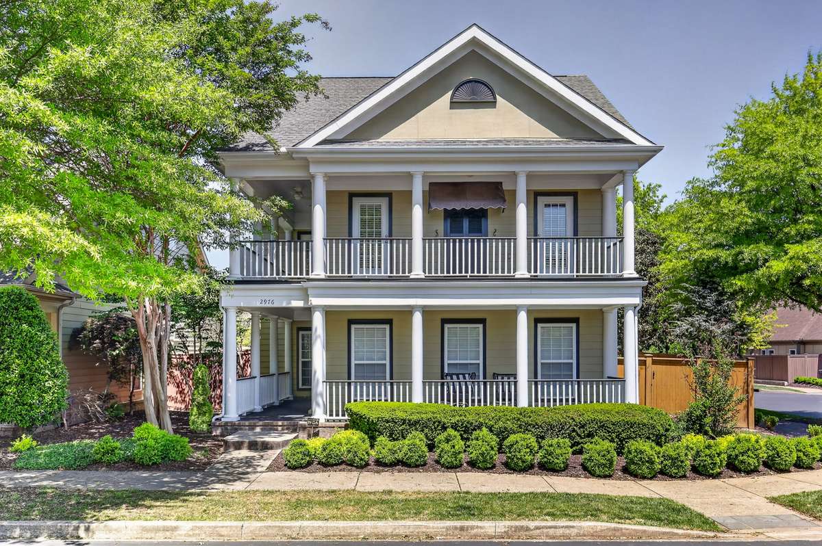 Tucked inside a gated community on a corner lot, this home blends Southern charm and modern luxury.