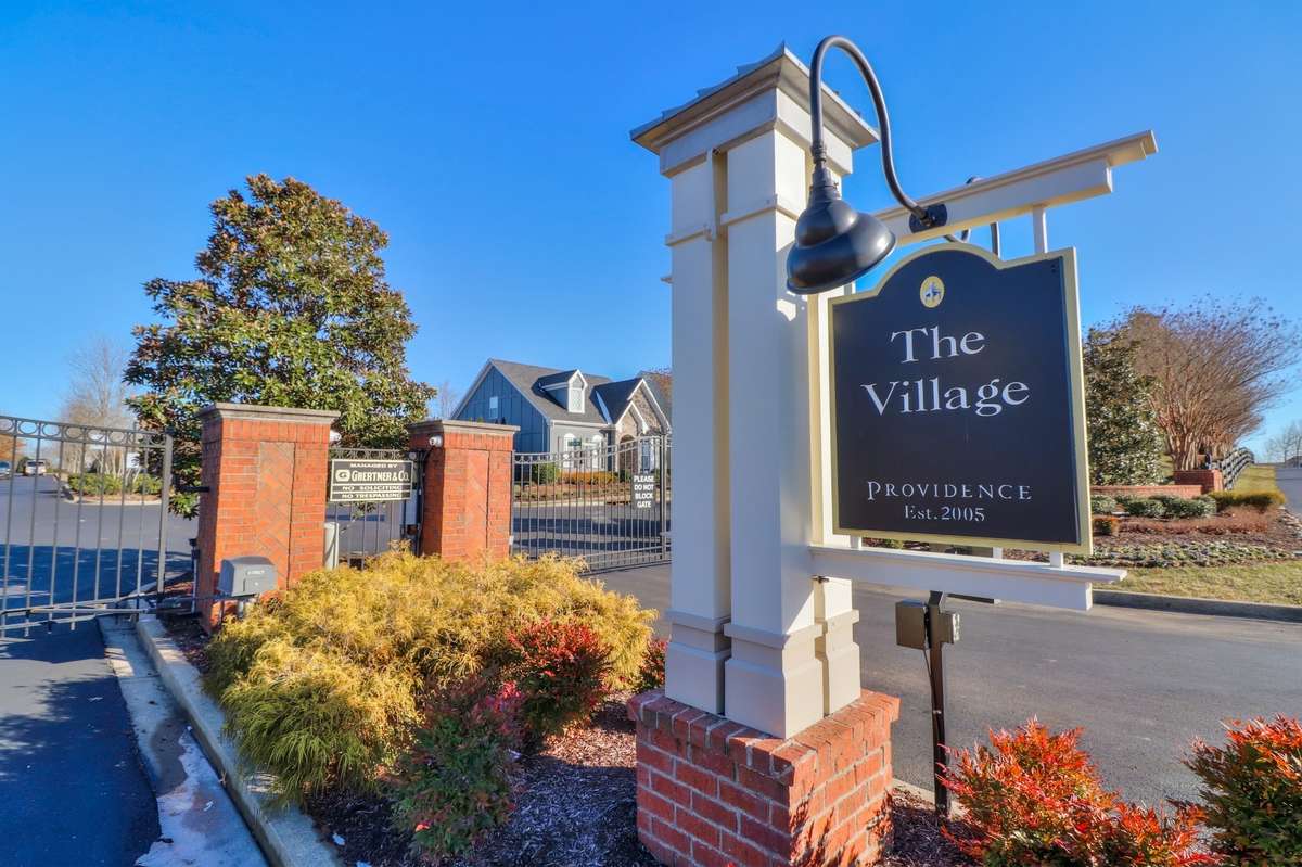 Inside The Village of Providence, a gated community near shopping and restaurants.