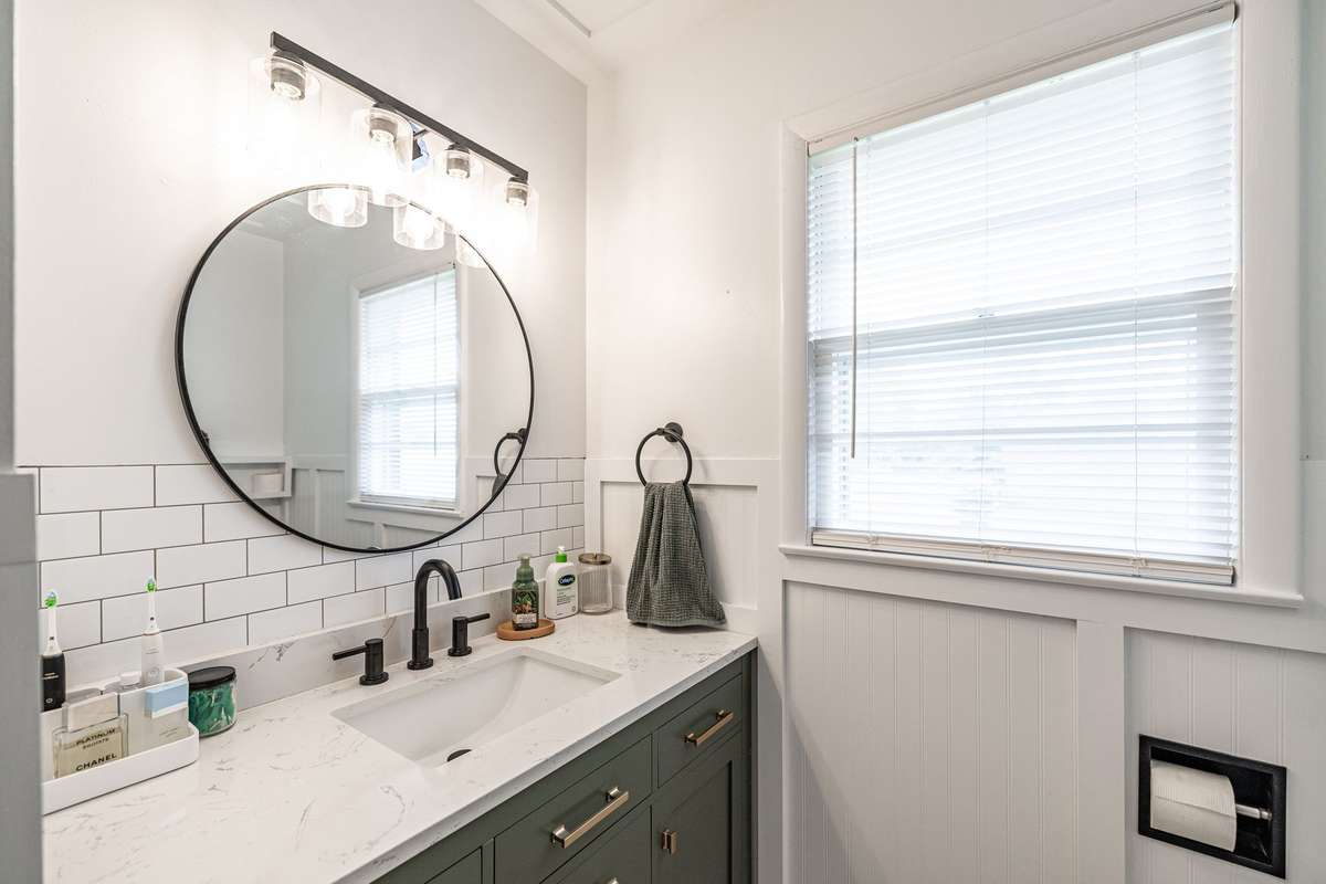 New vanity, faucet & lighting completely updated this bathroom~