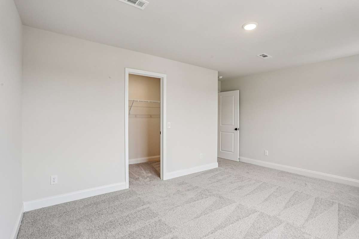 Bedroom #3 measures approximately 16' x 12' and includes a large walk-in closet.